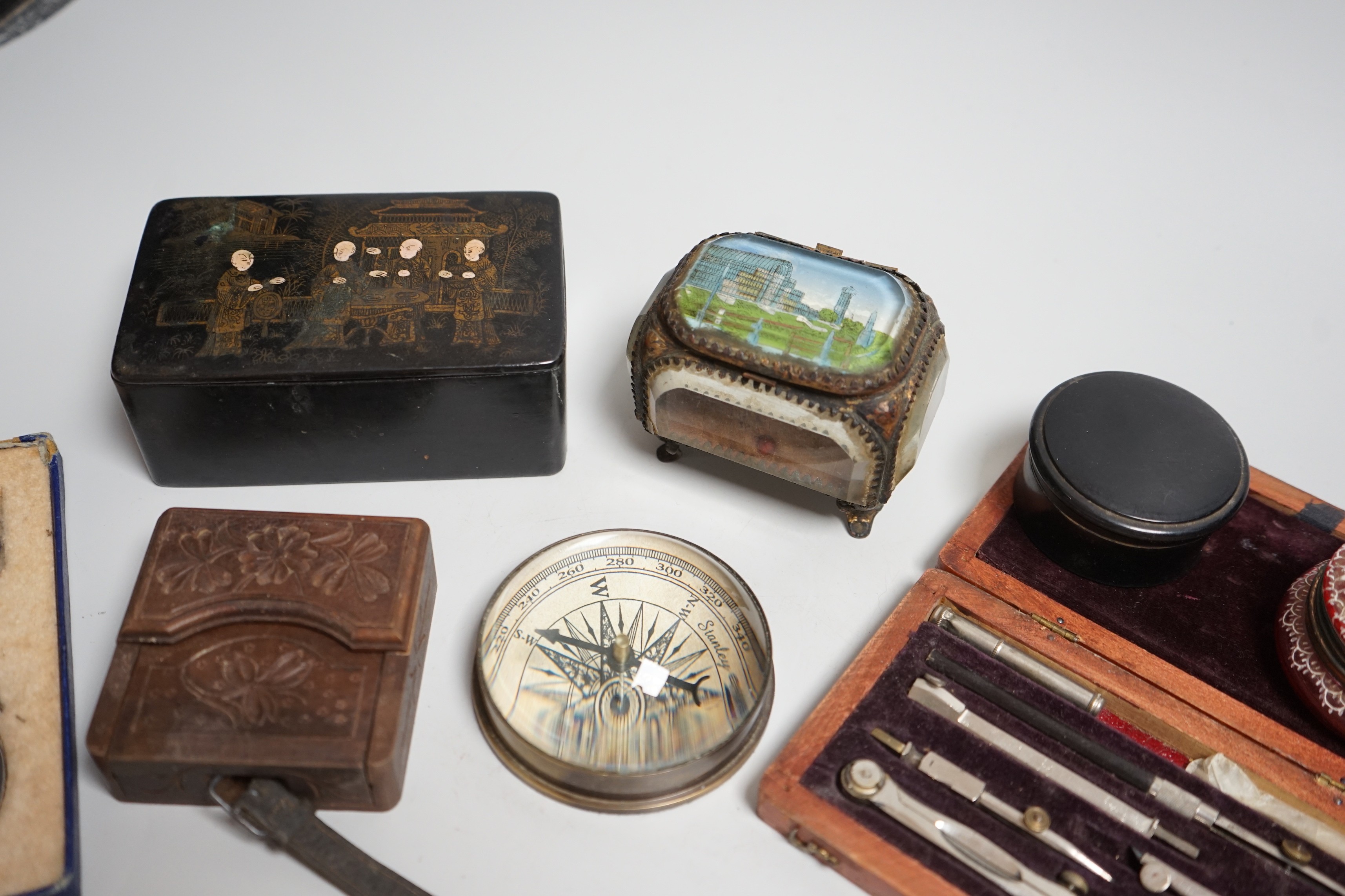 Mixed collectables: Stanley compass paperweight, a cranberry pot, a Great Exhibition souvenir casket, etc